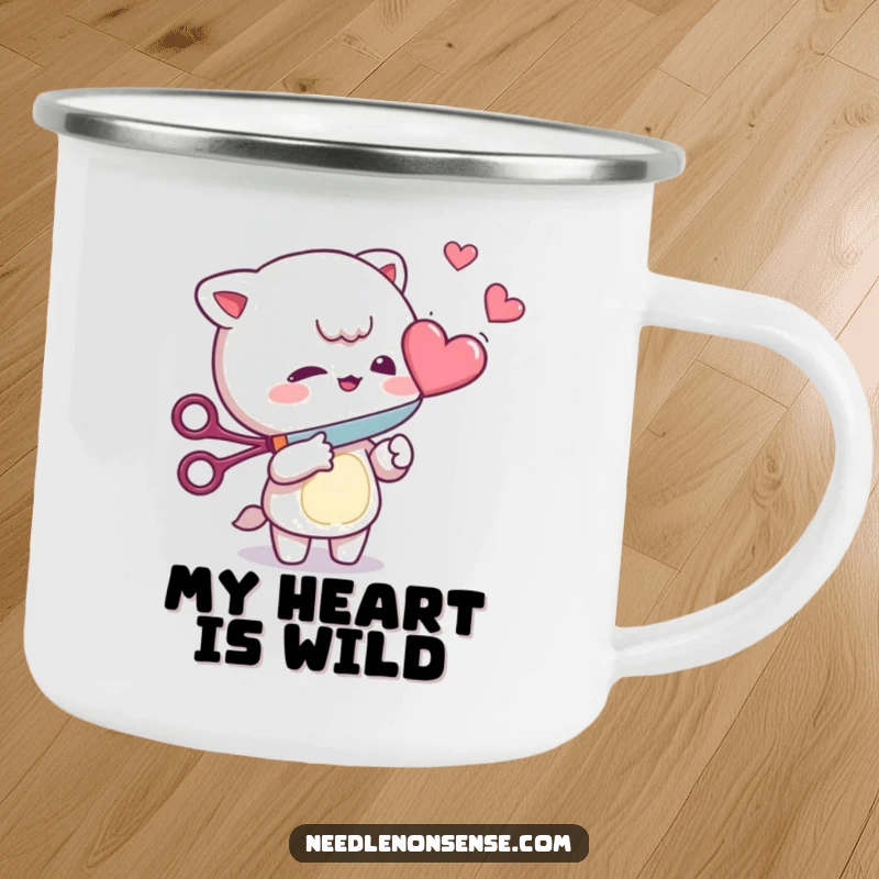 Funny Camping Mug: Mischievous character playfully cutting a floating heart with scissors, durable and humorous for outdoor use.