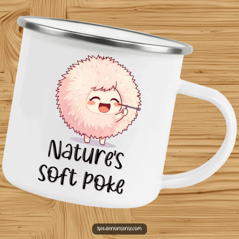 Funny camping mug featuring a joyful character playfully poking a pom-pom with a needle, perfect for drinks anywhere with crafting humor.
