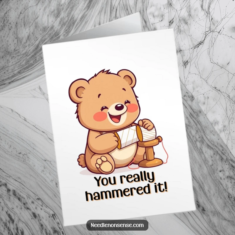 Funny Free Printable Congrats Card: A bear cub with a thimble enthusiastically hammers a spool, symbolizing success.