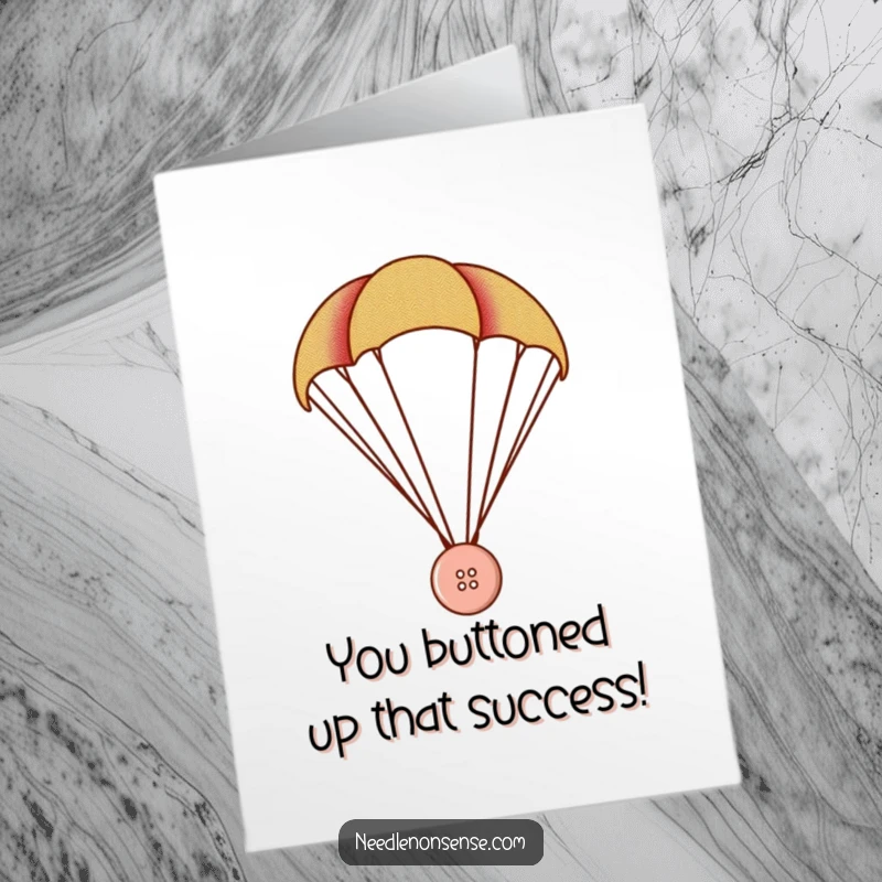 Funny Free Printable Congratulations Card: Tiny button uses fabric as a parachute, celebrating success with a unique flair.