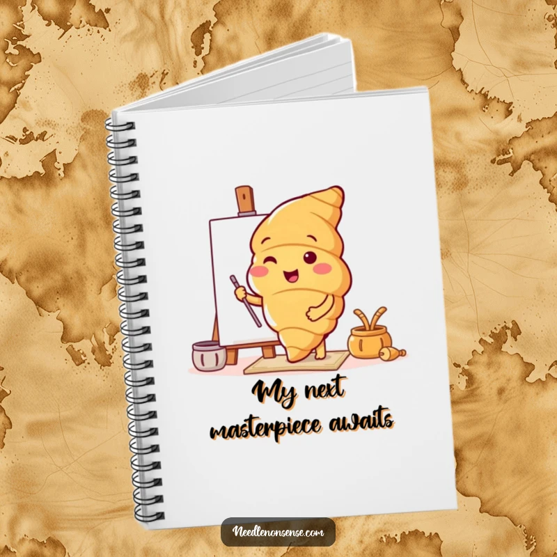 Funny notebook with a croissant character preparing a canvas, ideal for sketching designs and artistic ideas.