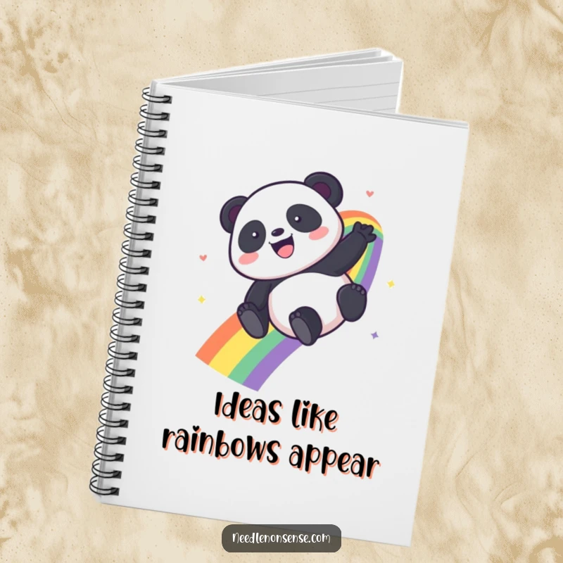 Funny Kawaii Panda notebook with a panda sliding down a rainbow, perfect for creative thoughts and notes.