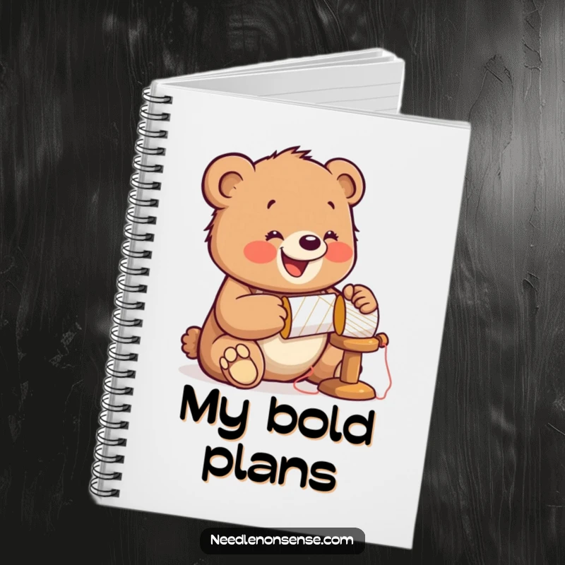 Funny Bear Sewing Notebook, featuring a jolly bear cub hammering a spool, perfect for jotting down sewing plans and ideas.