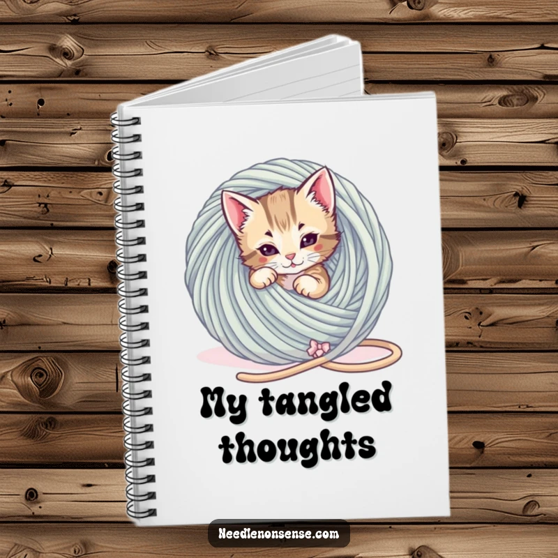 Funny Kitten Yarn Tangle Notebook, a playful kitten is tangled in a giant ball of yarn, funny journal.