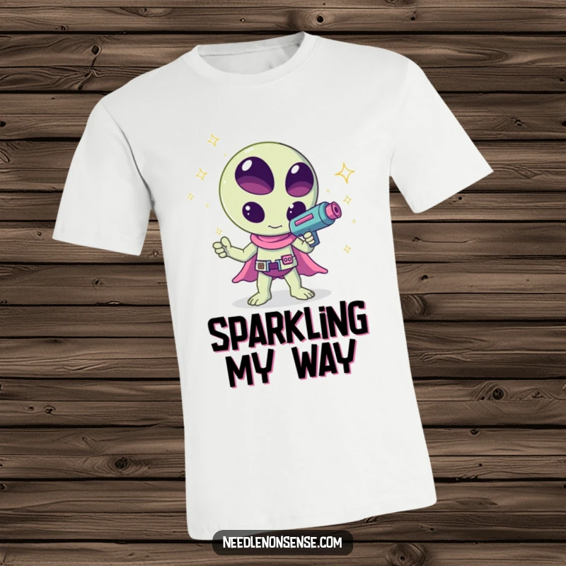 Funny kawaii alien waving a ray gun that emits sparkles, a humorous and creative design on this t-shirt, great for gifting.